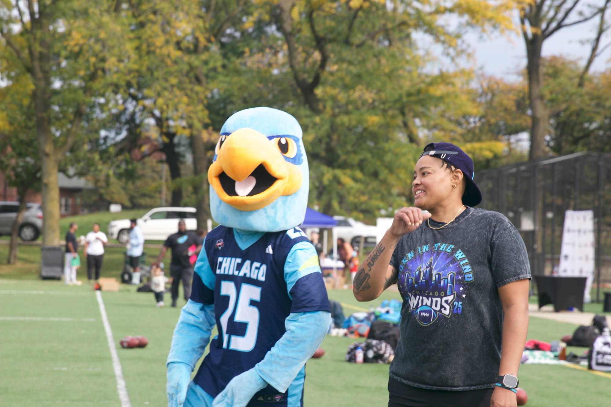 Angelique Smith and Breezy, mascot for Chicago Winds, watch tryouts. | Zoë Takaki/15 West