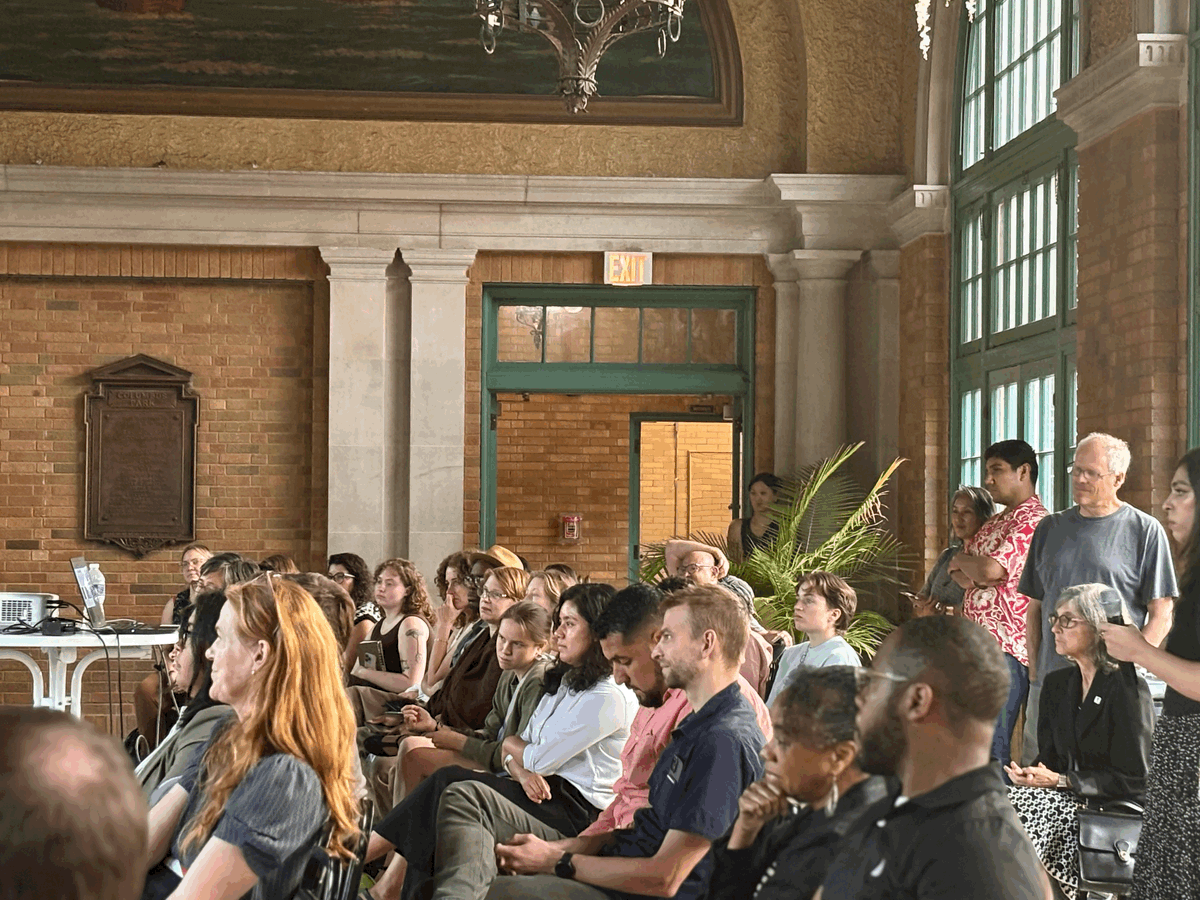 Pictured are dozens of residents, city officials, and community organizations, coming together to address extreme heat.
